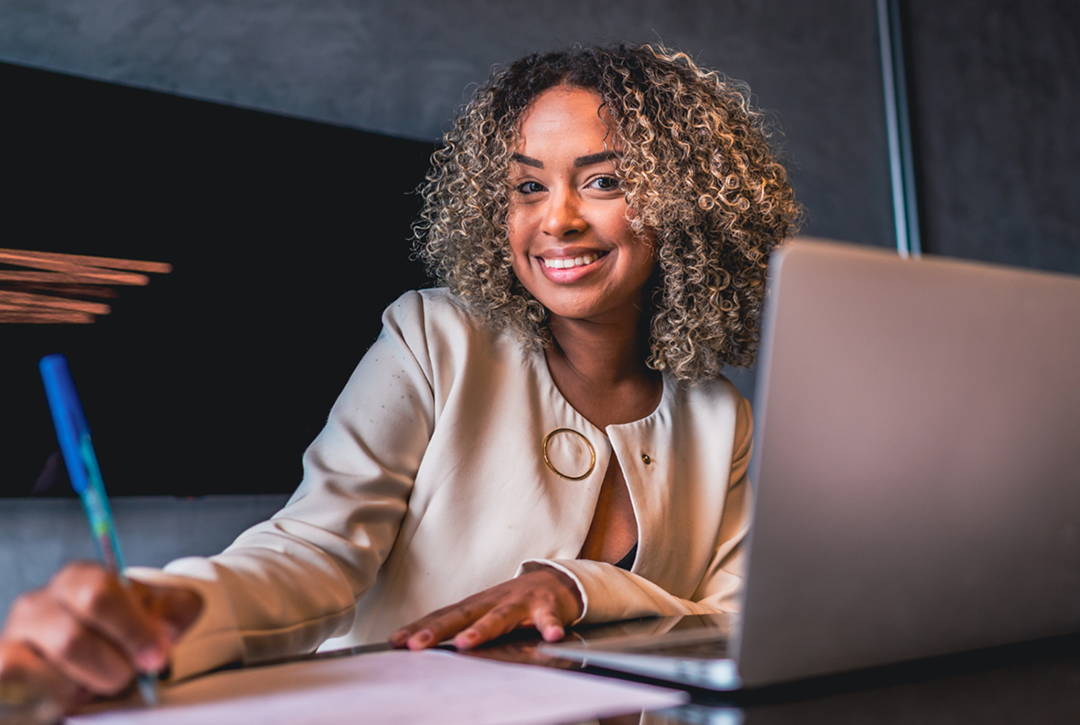 Woman working on paper documents